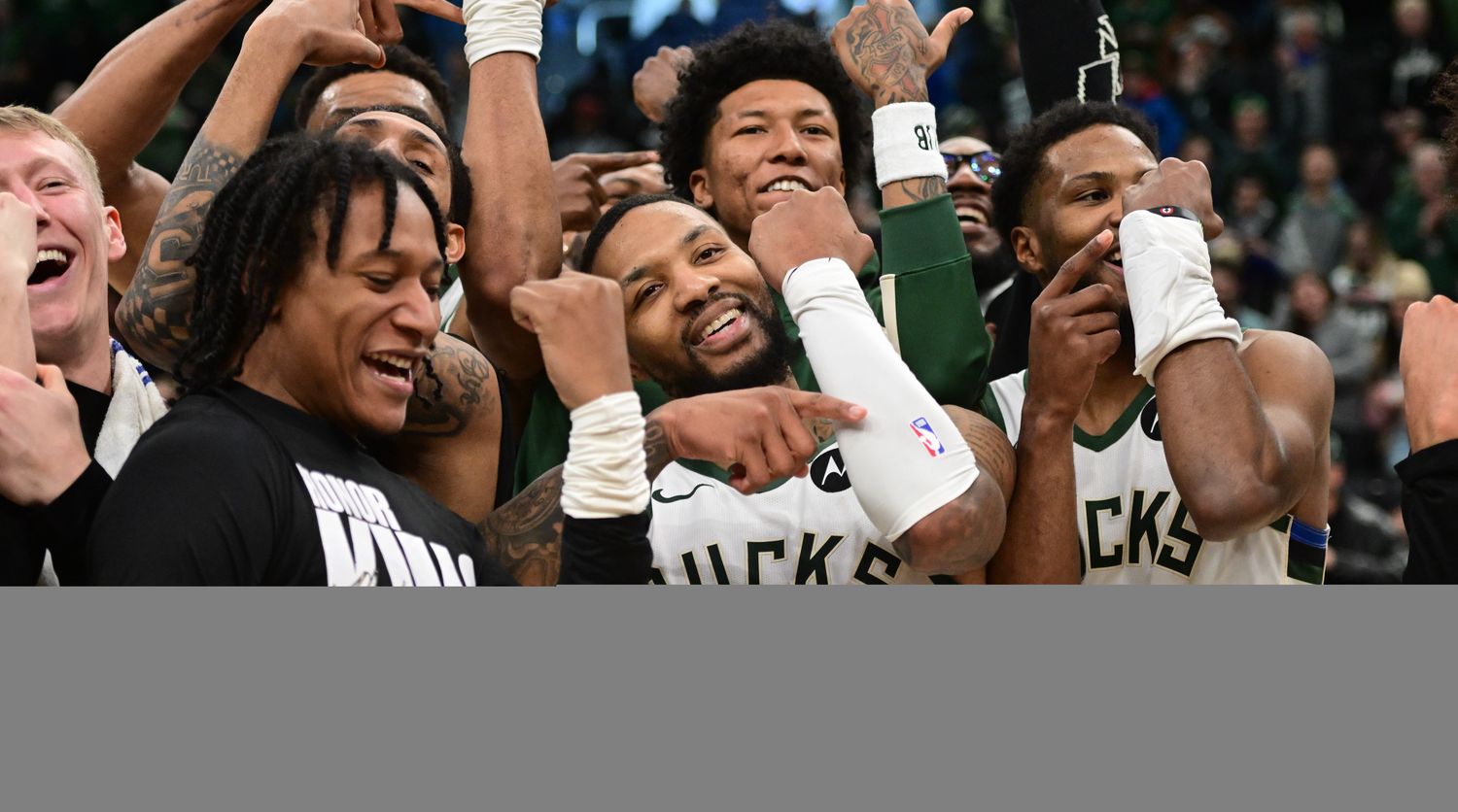 Milwaukee Bucks players celebrate Damian Lillard’s game-winning shot with the ‘Dame Time’ celebration.